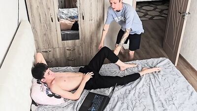 Young student with a big cock gives a smooth and expert handjob to her friend