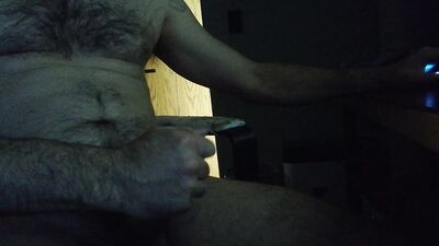 Watch witwabbit's hairy and tattooed body take on a massive dong in solo bear play