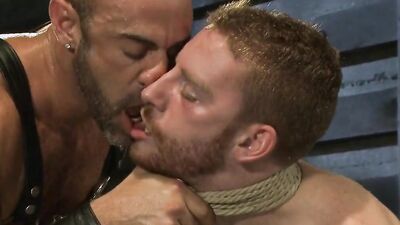 C.J. Madison ties up and whips out the cumshot of her boyfriend, while restrained by Sebastian Keys