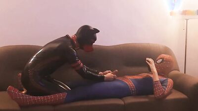 Spicy cosplay Spiderman bangs a kinky pup in hot latex action
