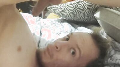 Watch me finger myself while folding over my juicy uncut cock