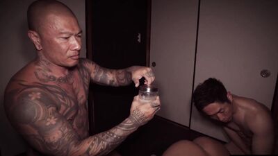 Watch Damian Dragon's big ass get stretched in wild gangbang action