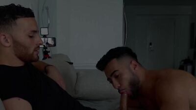 Amirpounding and his boyfriend ChrispapiXL take turns deepthroating and ball-sucking on a huge uncut cock