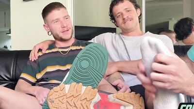 Watch Nick Charms & Nate Grimes give Jock Colt Spence a hot footjob & blowjob in full scene