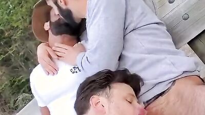 ProAloneDick joins in on a wild public threesome with a muscular guy and his buddy