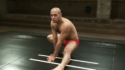 Watch Alessio Romero and Leo Forte oil up their bods in this hardcore wrestling match!