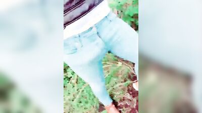 Horny man smokes a cigar and strokes that cock in the woods