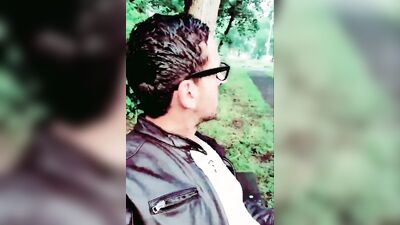 Horny man smokes a cigar and strokes that cock in the woods
