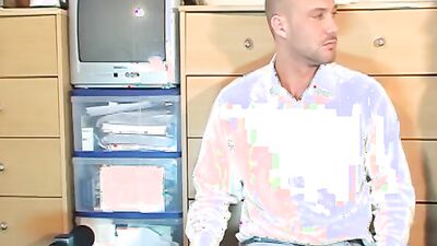 Straight guy is stroking his cock in front of the camera