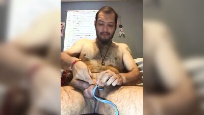 Tony Zel234 gets naughty with his dildo during a steamy massage