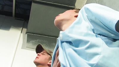 Watch these horny young boys pleasure each other in a sweaty threesome on a construction site