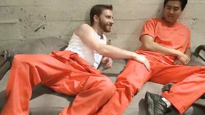 Two perverts dominate officer Andrew Justice with their giant cocks and lock him up in bondage