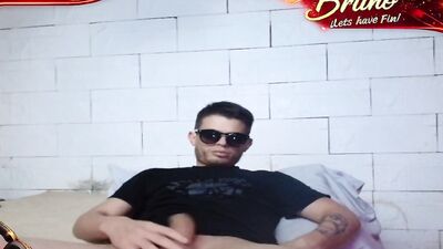 Watch this amateur Argentinian get bred by a strapon while on webcam